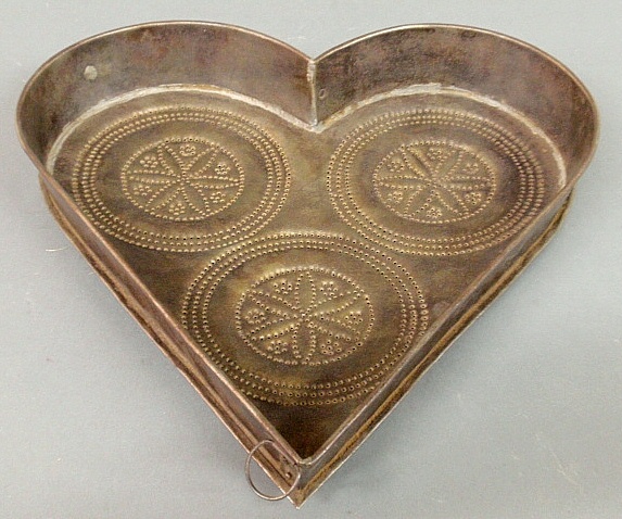 Appraisal: - Pennsylvania German tin heart-shaped cheese strainer th c h