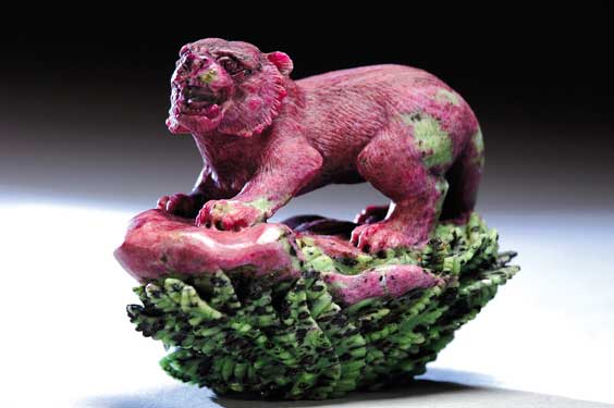 Appraisal: RUBY IN ZOISITE TIGER Finely carved ruby in zoisite model