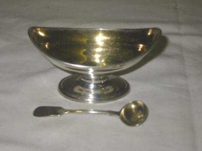 Appraisal: A GEORGE III SALT of ogee boat form on moulded