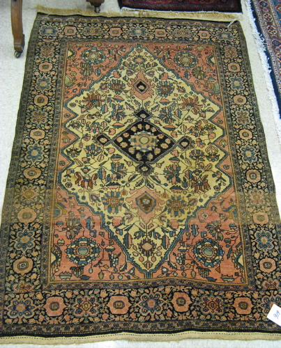 Appraisal: SEMI-ANTIQUE PERSIAN FARAHAN AREA RUG hand knotted in a central