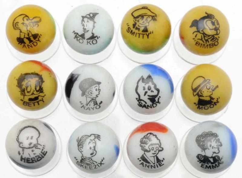 Appraisal: Lot of Peltier Comic Marbles Complete set All with good