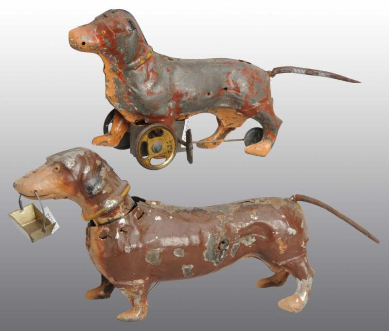 Appraisal: Lot of Tin Hand-Painted Dachshund Dog Toys Description German Working