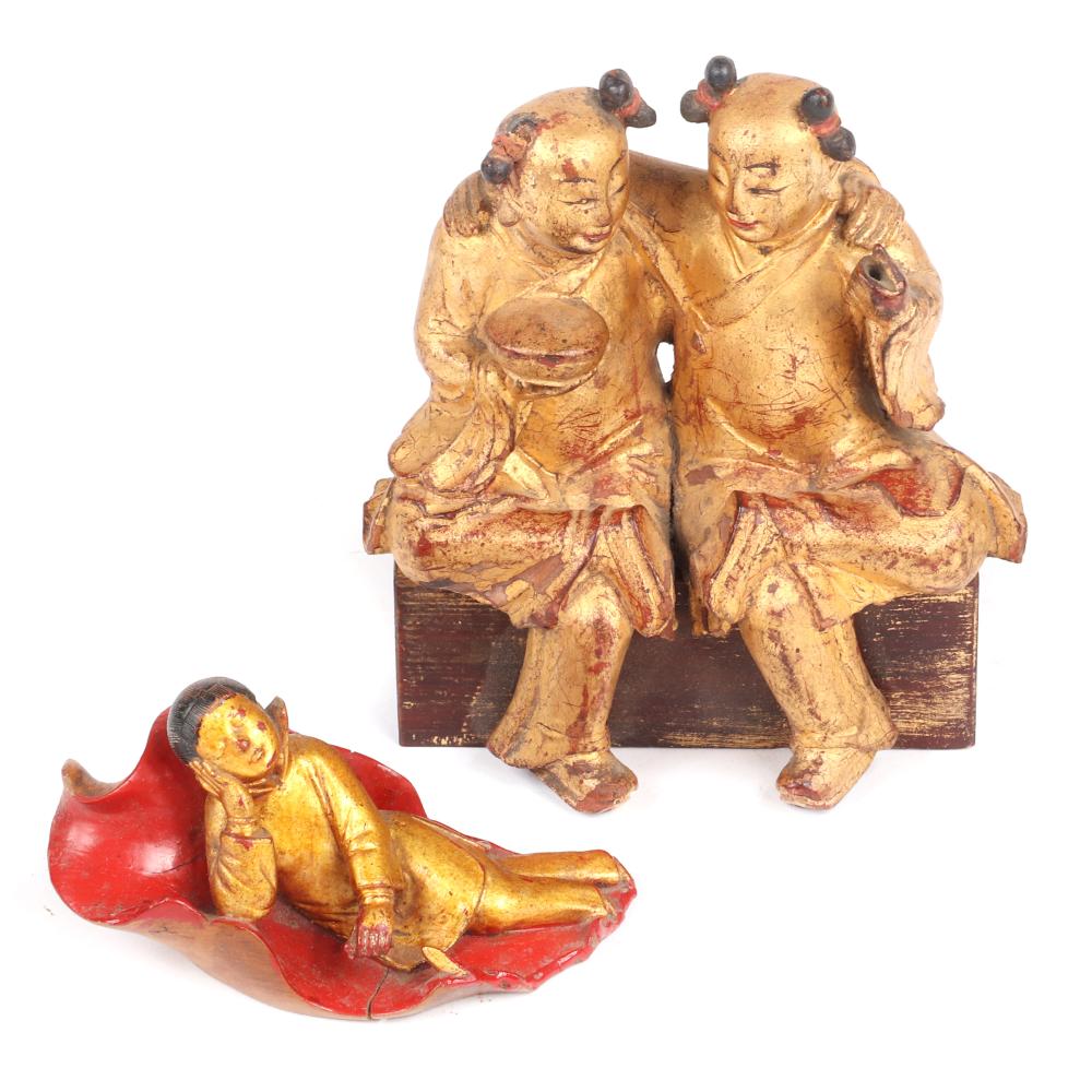 Appraisal: TWO CHINESE GILTWOOD FIGURE CARVINGS DEPICTING A BOY ON A