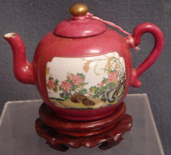 Appraisal: Chinese porcelain teapot plum field with fine gilt design reserve