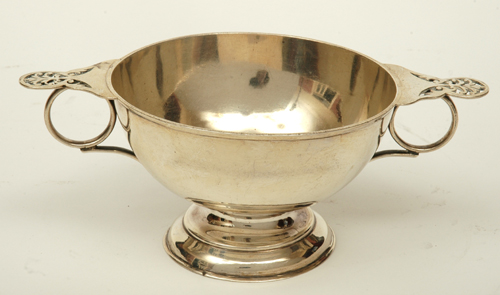 Appraisal: AN EDWARDIAN STERLING SILVER TWO HANDLED BOWL Birmingham