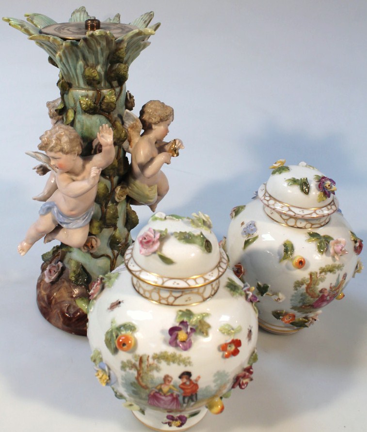 Appraisal: A pair of Meissen style vases each circular shouldered body