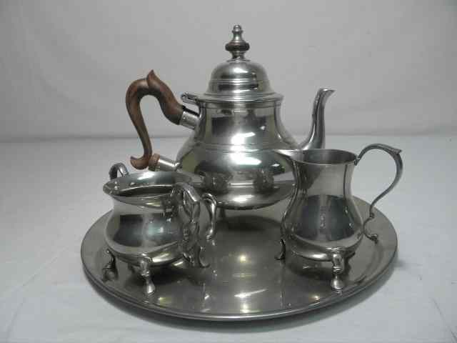 Appraisal: Williamsburg Stieff pewter four piece tea coffee set Includes Stieff