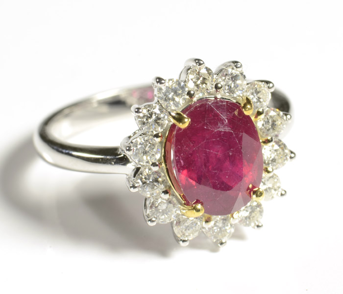 Appraisal: RUBY DIAMOND AND FOURTEEN KARAT WHITE GOLD RING centering a