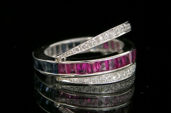 Appraisal: A Triple Eternity Ring with Diamonds Rubies and Sapphires k