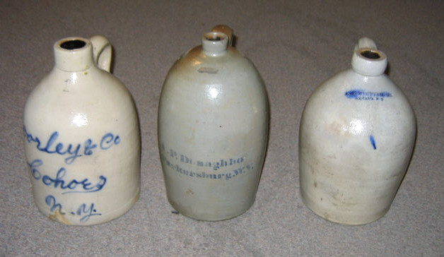 Appraisal: THREE STONEWARE JUGS One gallon each with signatures blue cobalt