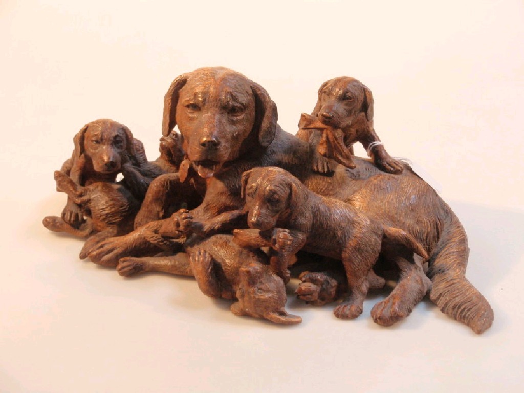 Appraisal: A Bavarian carved figure of a Labrador and pups cm