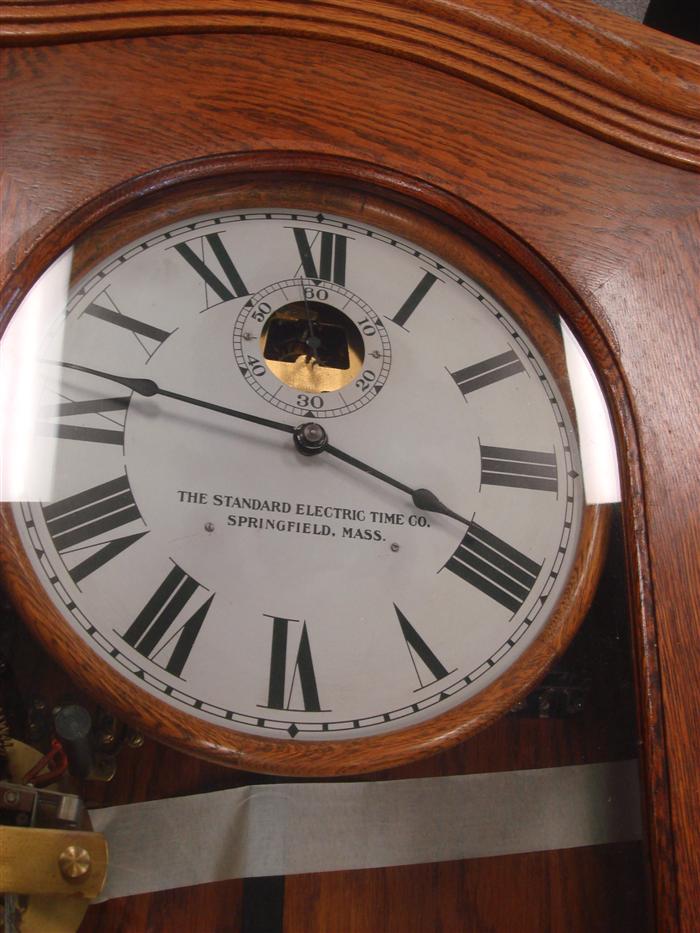 Appraisal: Standard Electric Time Co self winding master clock oak case