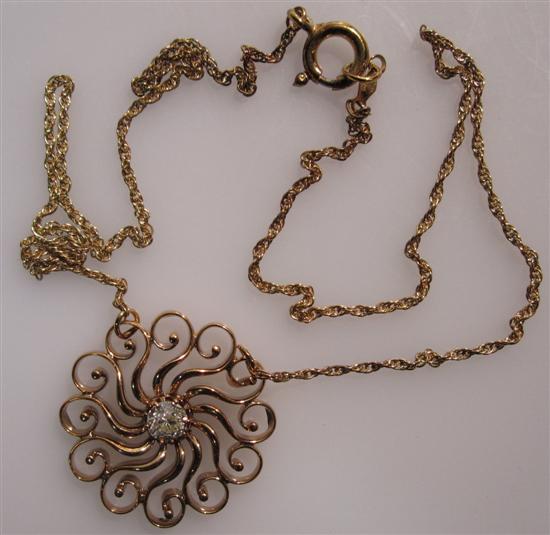 Appraisal: K Gold Swirl Pendant set with diamonds grams