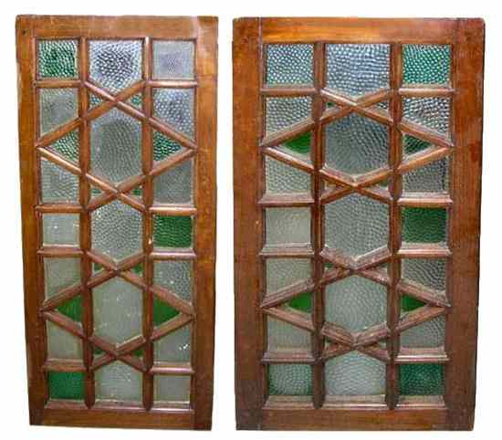 Appraisal: A Pair of North Indian Moorish Style Teak Framed Transom