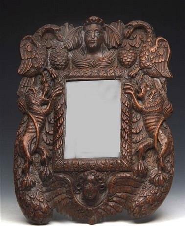 Appraisal: A TH CENTURY CARVED OAK HANGING WALL MIRROR with central