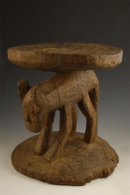 Appraisal: A Cameroon carved wood stool the oval dish top on