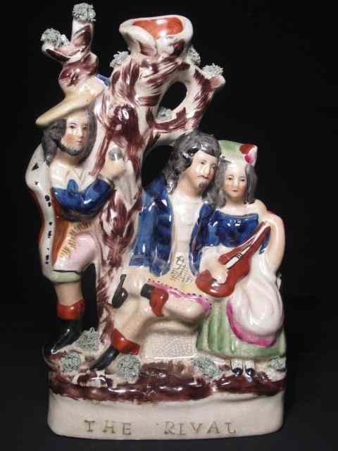 Appraisal: Large th century English Staffordshire figurine titled ''The Rival'' Measures