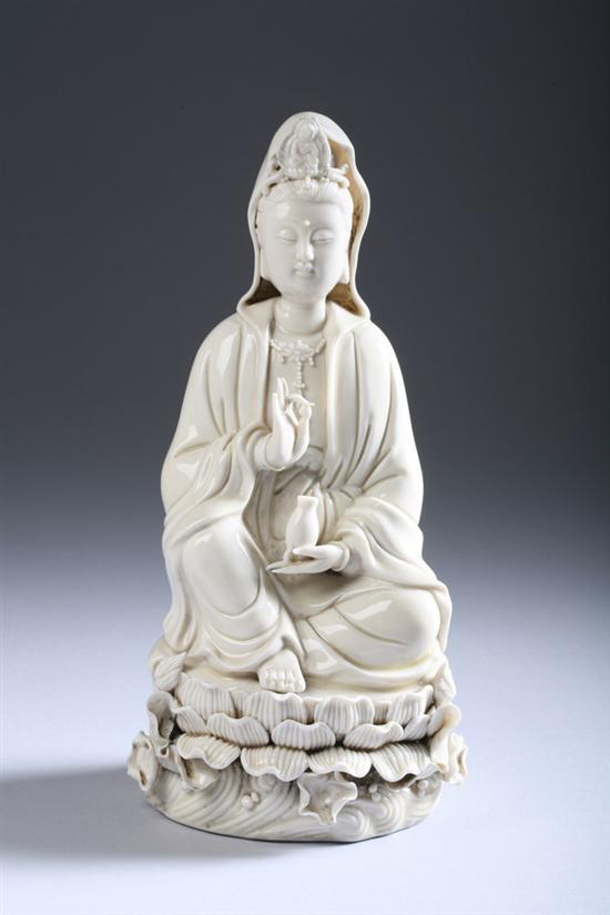 Appraisal: CHINESE BLANC-DE-CHINE FIGURE OF GUANYIN Qing Dynasty Seated at ease