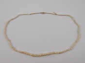 Appraisal: A natural pearl necklace approx cm long accompanied by Gem