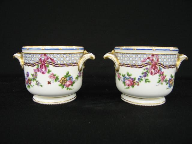 Appraisal: Pair of Sevres Porcelain Cache Pots handpainted floral garland elaborate