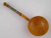 Appraisal: A Russian Karolean birch spoon the handle enriched with cloisonne