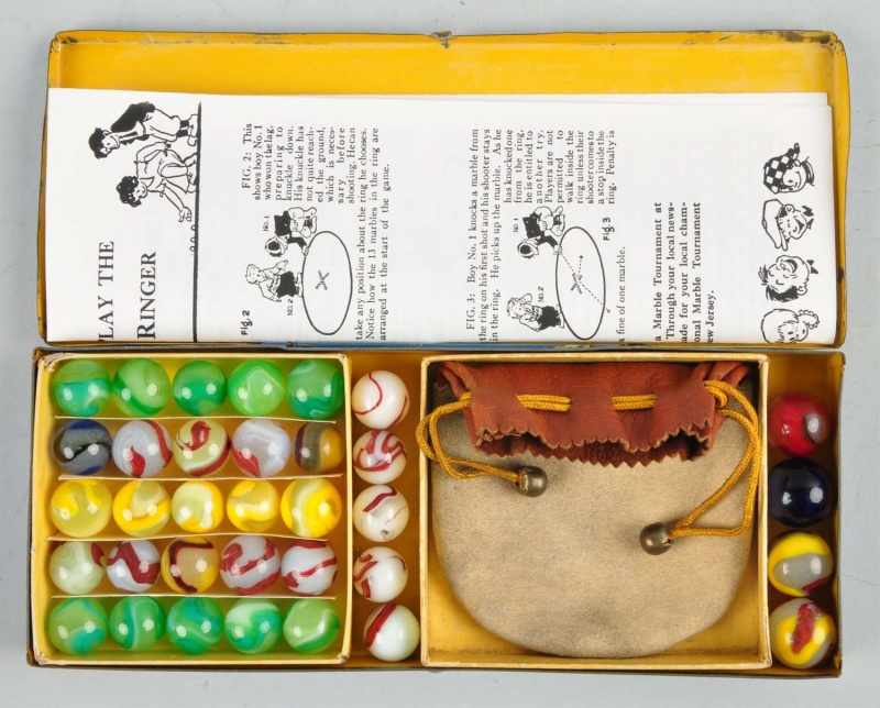 Appraisal: Tin No Box Set of Akro Agate Marbles Description Box