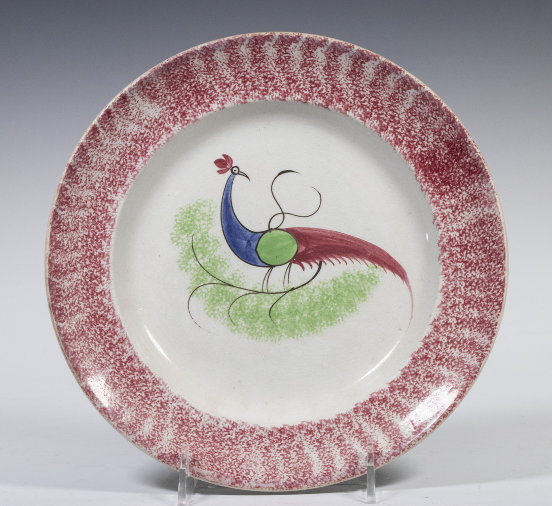 Appraisal: ENGLISH RED SPATTERWARE PEAFOWL PLATE th c Ceramic Plate with