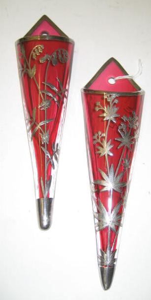 Appraisal: A PAIR OF LATE VICTORIAN CRANBERRY GLASS WALL POCKETS of