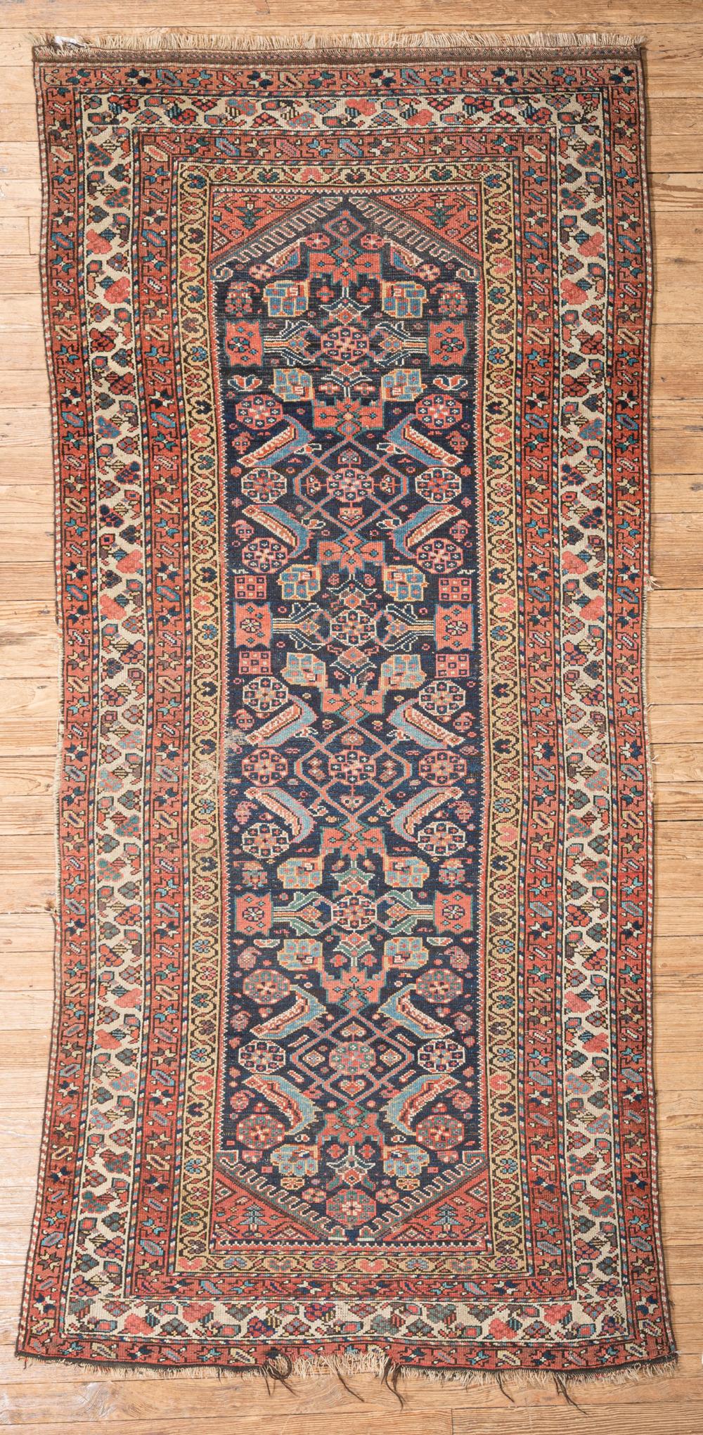 Appraisal: Antique Fereghan Rug blue central ground serrated spandrels allover stylized