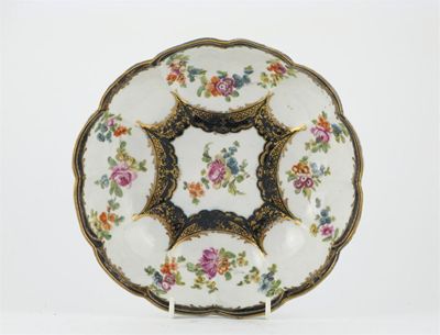 Appraisal: A lobed Chelsea-Derby bowl painted with colourful floral garlands within