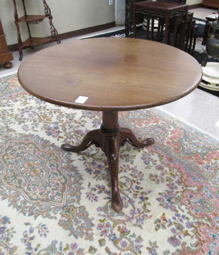 Appraisal: GEORGE III MAHOGANY TILT-TOP TEA TABLE English early th century