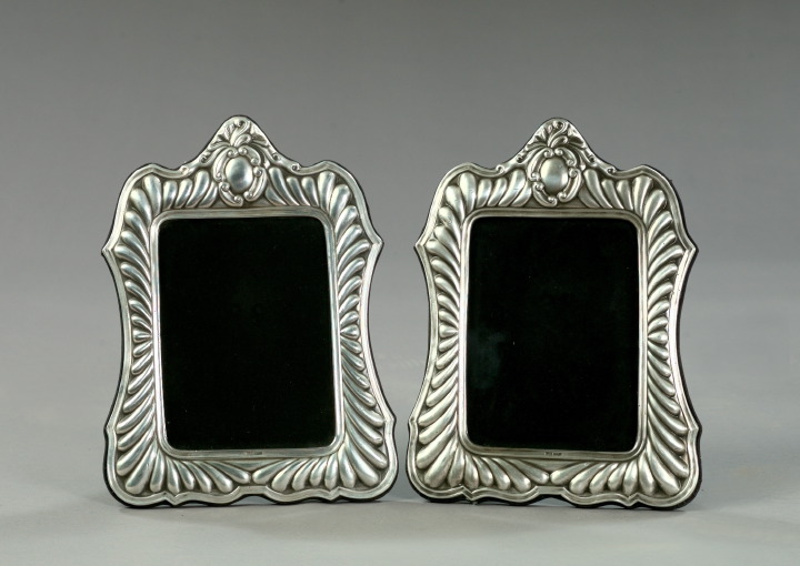 Appraisal: Pair of Italian Embossed -Standard Silver Photograph Frames in the