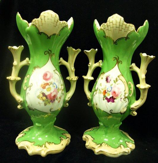 Appraisal: A pair of mid th Century Staffordshire vases of pear