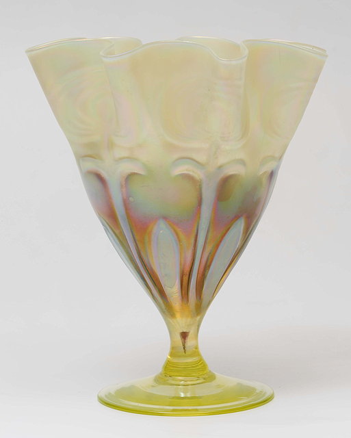 Appraisal: A CONTINENTAL YELLOW LUSTRE LOETZ STYLE VASE with a wavy