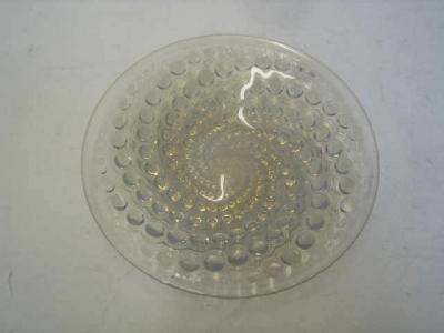 Appraisal: A LALIQUE CLEAR GLASS DISH Volutes moulded in relief with