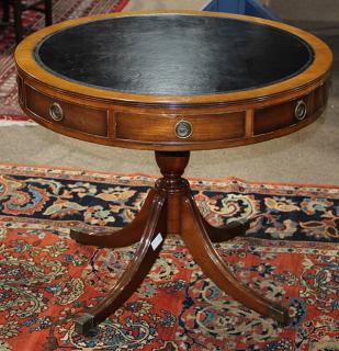 Appraisal: George III style drum or rent table having an embossed