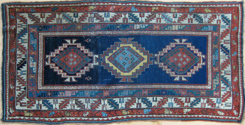 Appraisal: Kazak rug ca with three medallions on a blue field