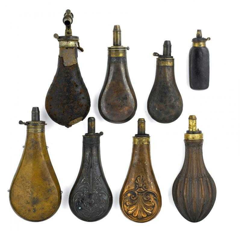 Appraisal: SIX VICTORIAN COPPER POWDER FLASKS AND A COPPER PISTOL FLASK