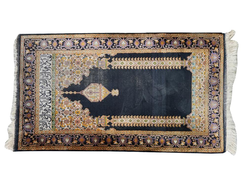 Appraisal: PERSIAN SILK PRAYER RUGthe design incorporating an inscription Condition wear