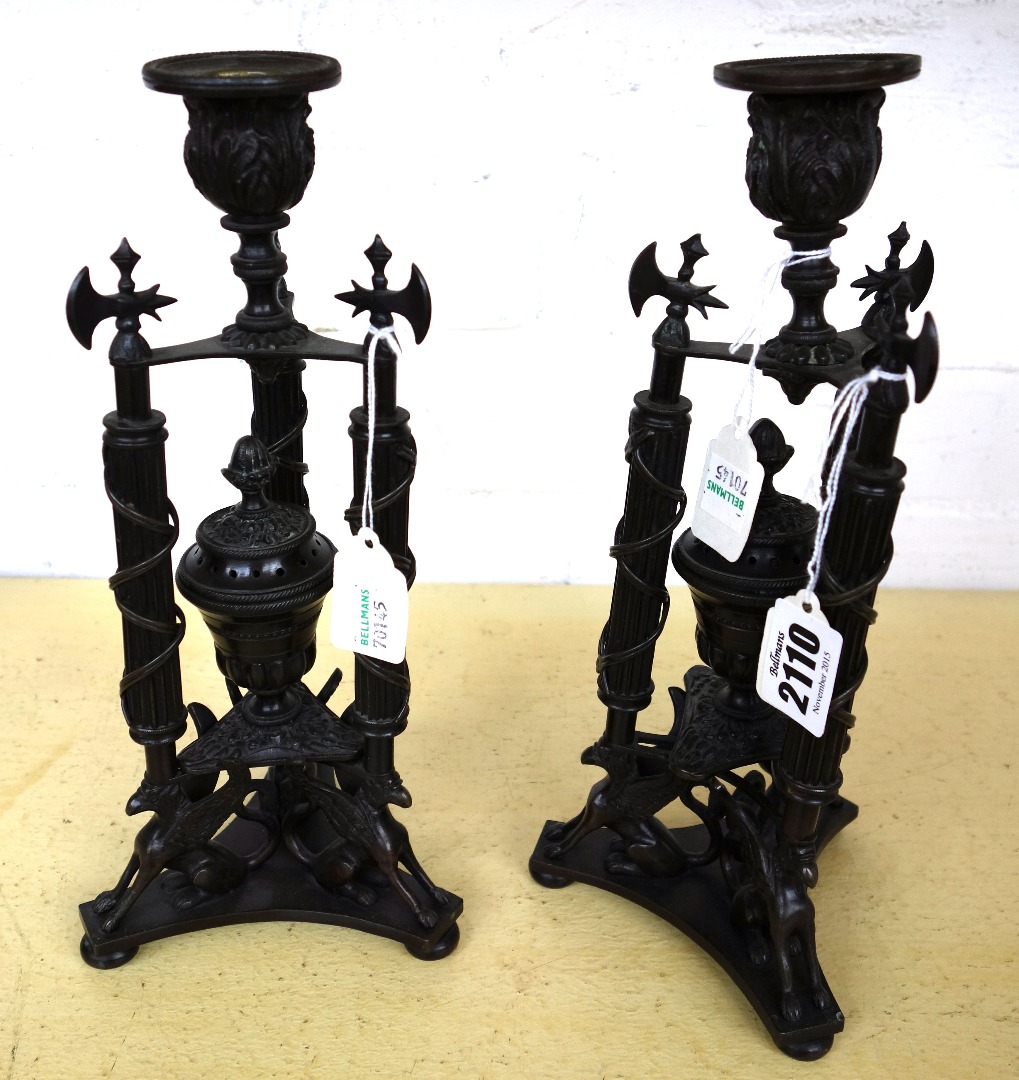 Appraisal: A pair of George IV style bronze candlesticks the fluted