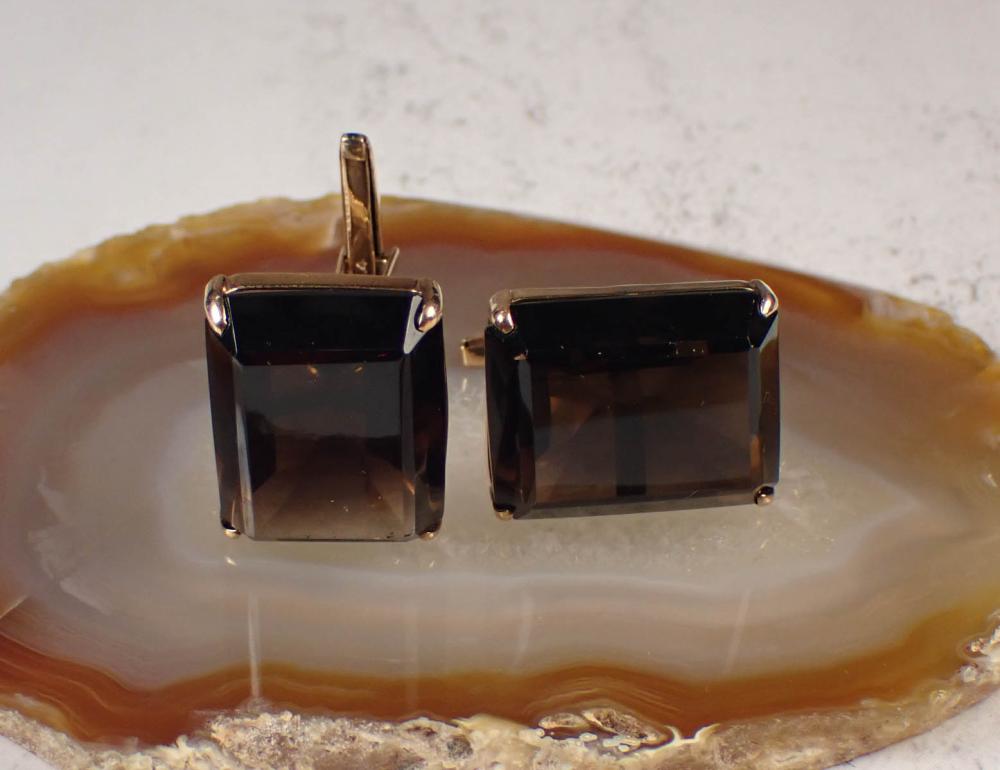 Appraisal: PAIR OF SMOKY QUARTZ AND FOURTEEN KARAT GOLD CUFFLINKS each