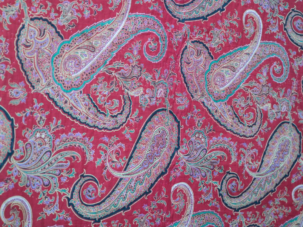 Appraisal: GOOD DURHAM QUILT with bold paisley pattern double-sided on a