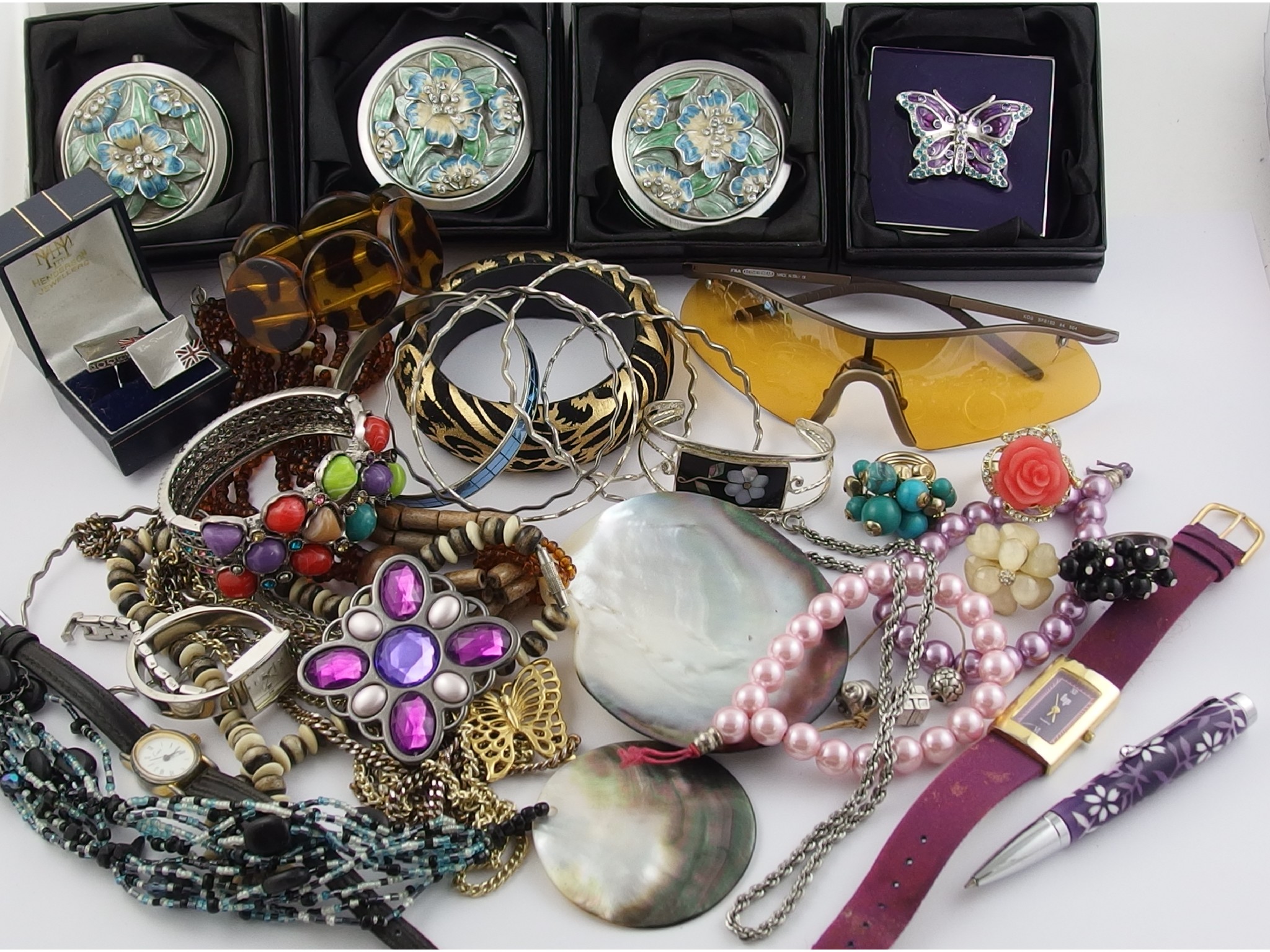 Appraisal: A collection of costume jewellery to include four compacts and