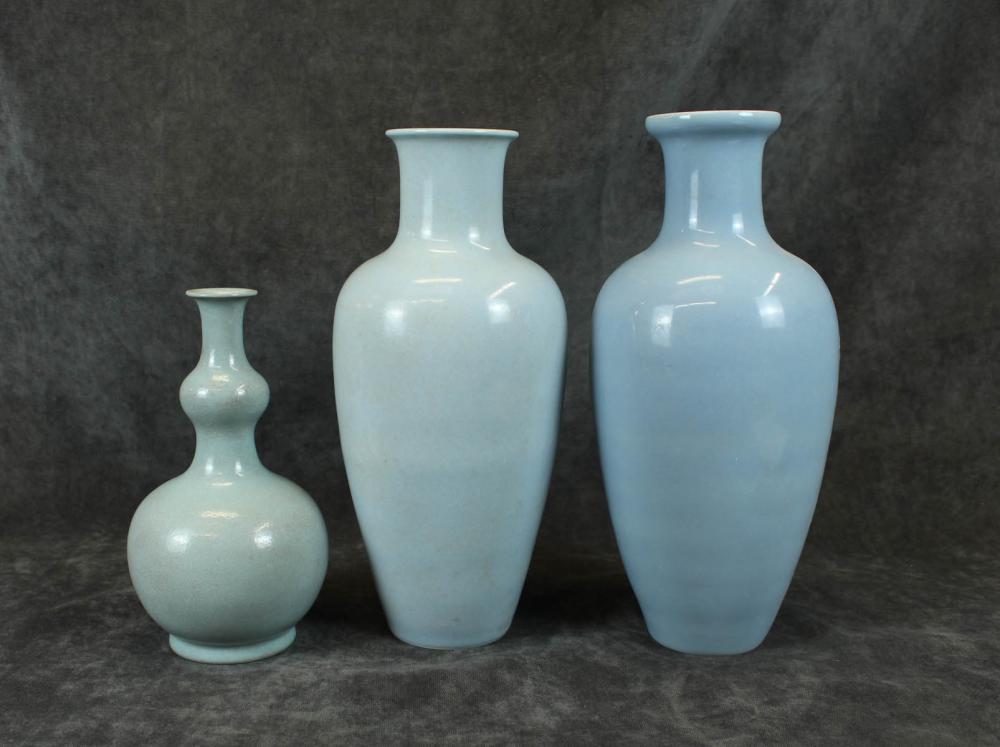 Appraisal: THREE CHINESE CLAIR-DE-LUNE PORCELAIN VASES all with pale blue monochrome