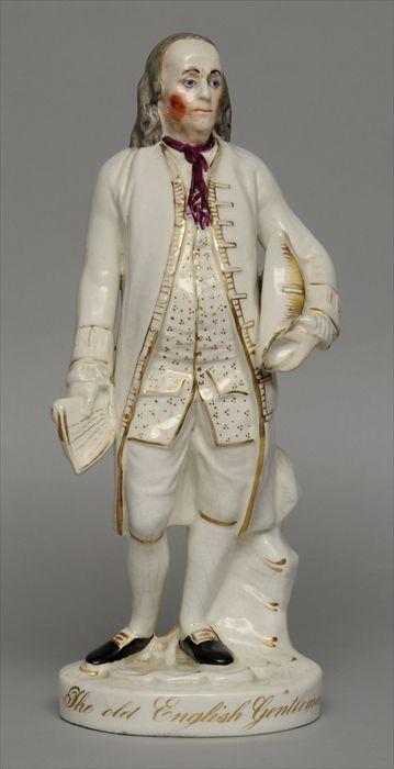 Appraisal: STAFFORDSHIRE FIGURE OF BENJAMIN FRANKLIN Modeled holding a tricorn hat