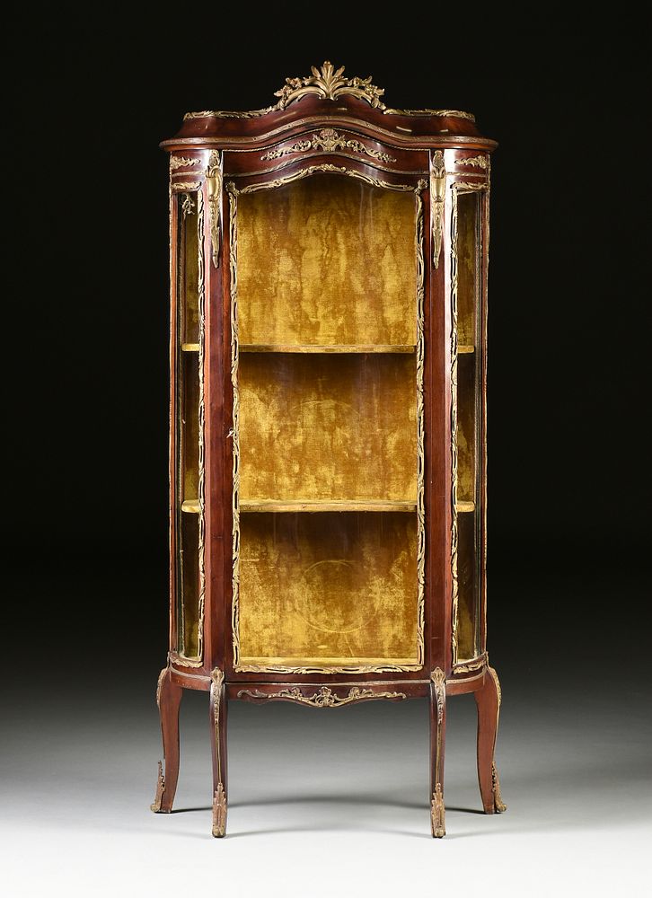 Appraisal: A LOUIS XV STYLE GILT BRONZE MOUNTED MAHOGANY BOMB VITRINE