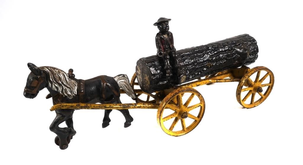 Appraisal: Black Americana Kenton cast iron horse drawn log wagon with