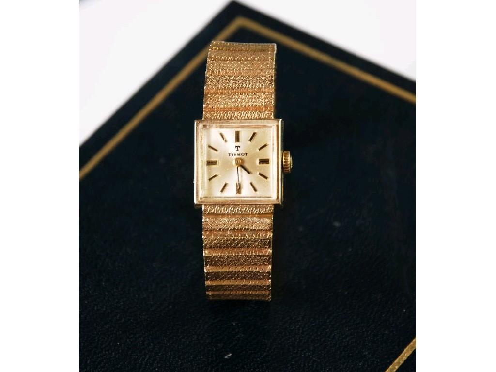 Appraisal: LADY'S TISSOT CT GOLD WRISTWATCH with square silvered dial mechanical