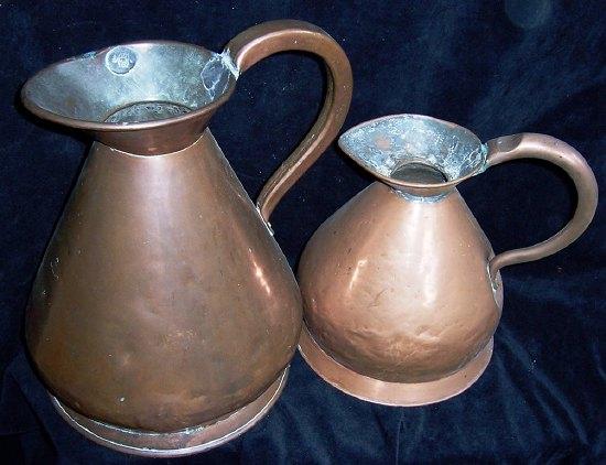 Appraisal: A large copper rum jug marked G R cm high