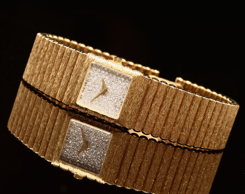 Appraisal: A ladies' K yellow gold and diamond quartz wristwatch The